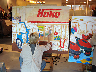schilderende mensen op een workshop op lokatie, in dit geval tijdens een familiedag