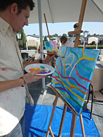 Workshop schilderen op lokatie na een dag vergaderen, de spanning omzetten in creativiteit
