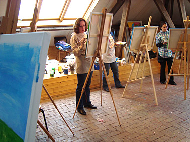 workshop schilderen met collega's direkt op doek bedrijfsuitje